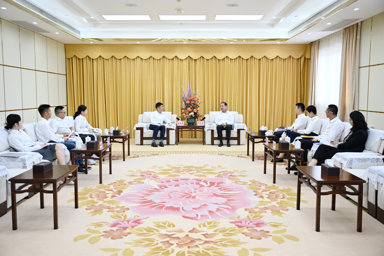 范少軍會見山河智能董事長付向東